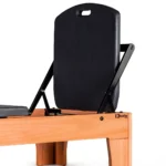 Camilla reforzada con extensión ajustable para tratamientos profesionales.